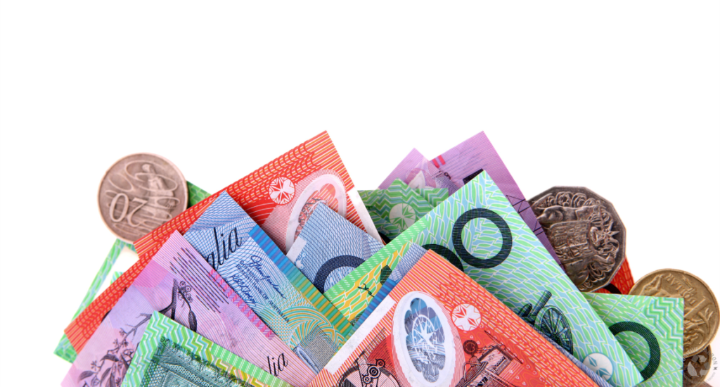 Australian dollar notes and coins stacked together, representing financial savings and rebates under the VEU program 