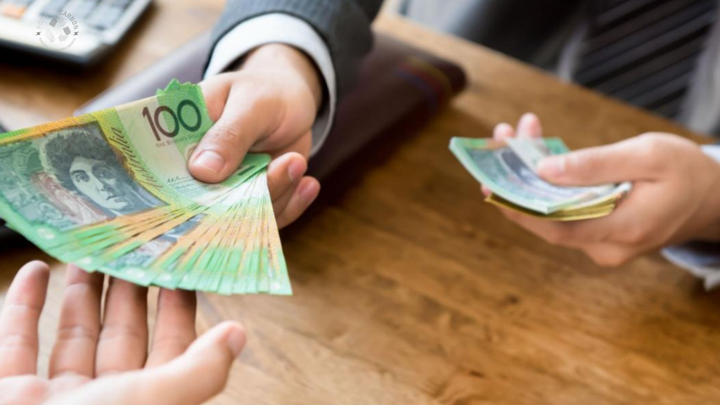 Homeowner saving money on energy bills with an efficient hot water system
